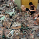 People sorting e-waste in Guiyu.